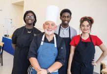 Chef Brannon Soileau with students Nina, Moses, and Melany. Photo by Steven Martine